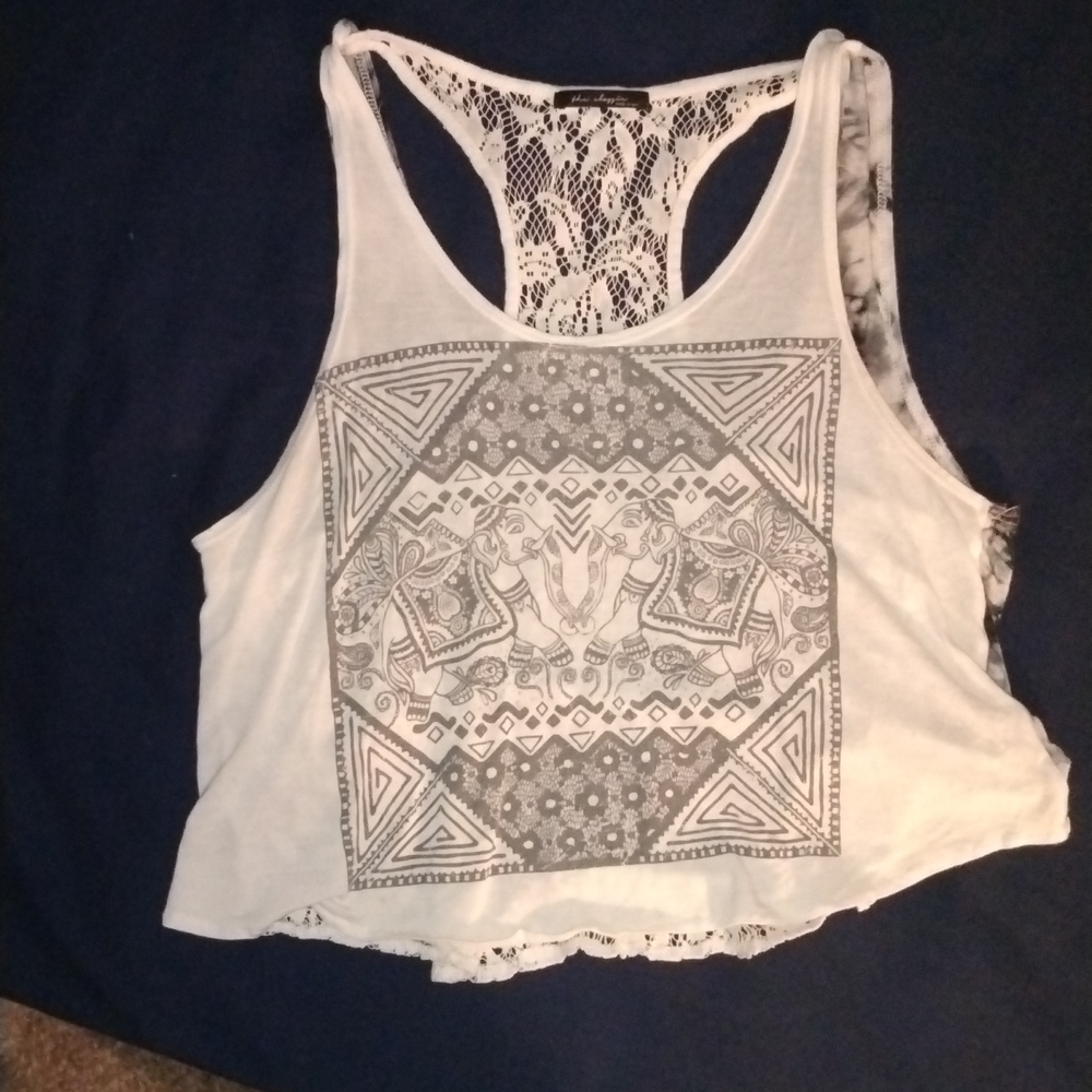 Middrift top with lace back not sure about the brand. Size small